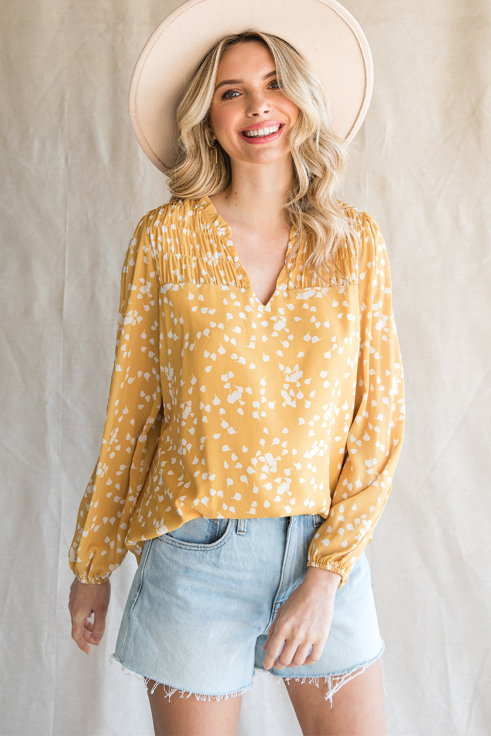 The NO Double Take Printed Notched Neck Smocked Blouse