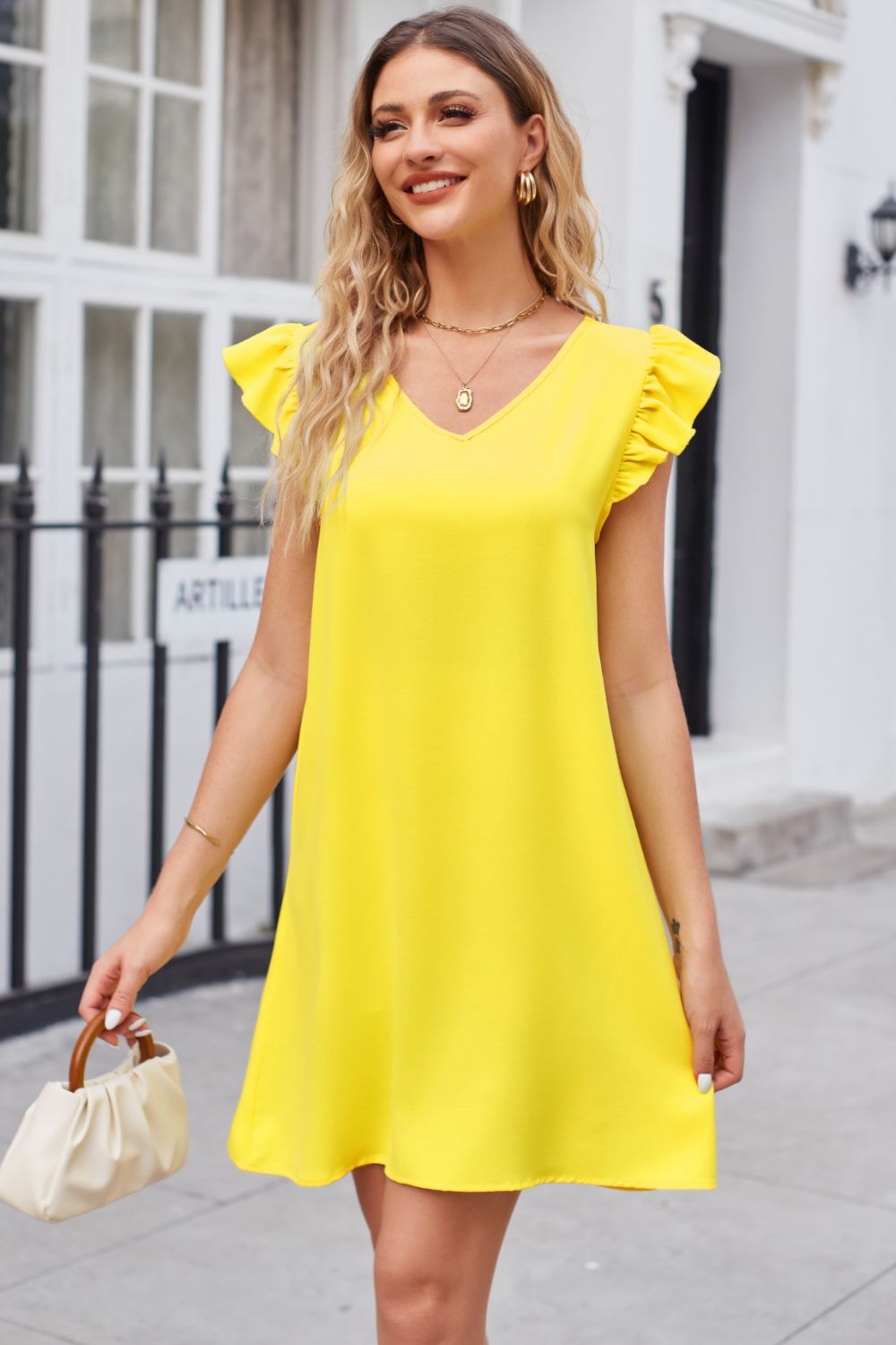 A dress is always in style Ruffled V-Neck Flutter Sleeve Dress