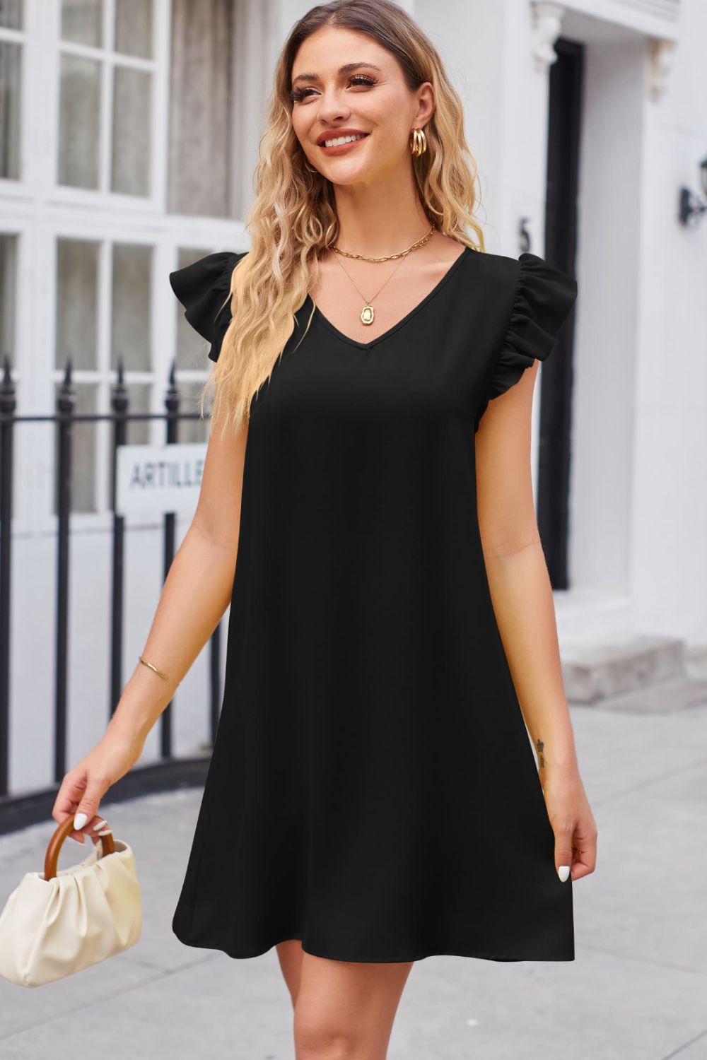 A dress is always in style Ruffled V-Neck Flutter Sleeve Dress