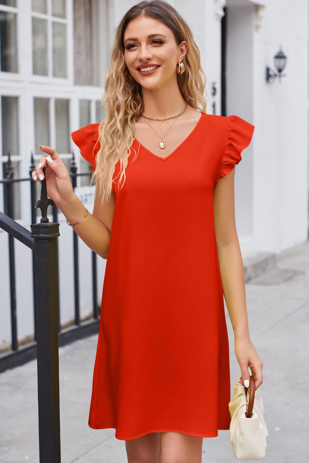 A dress is always in style Ruffled V-Neck Flutter Sleeve Dress