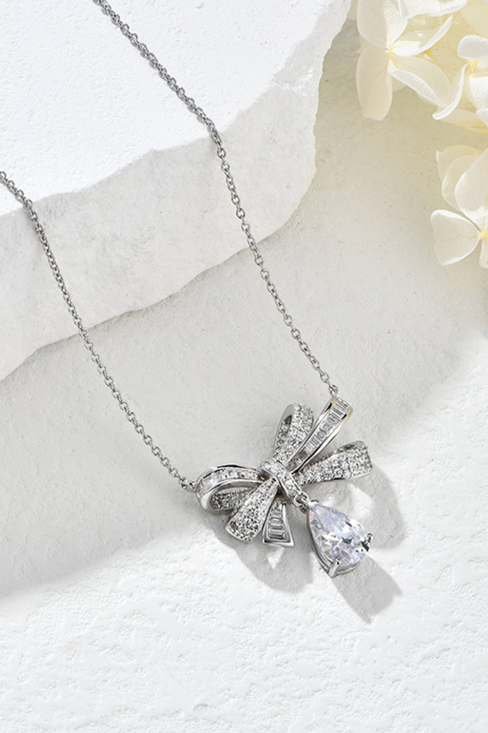 Gorgeous and elegant, this bow teardrop Teardrop Shape 925 Sterling Silver Zircon Pendant Necklace