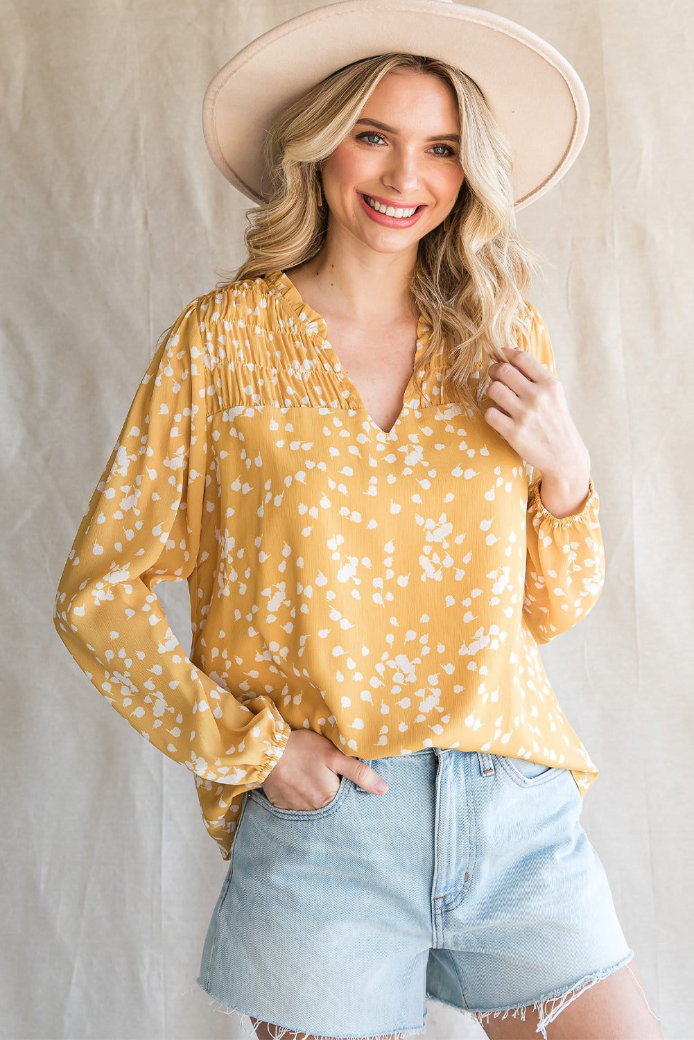 The NO Double Take Printed Notched Neck Smocked Blouse