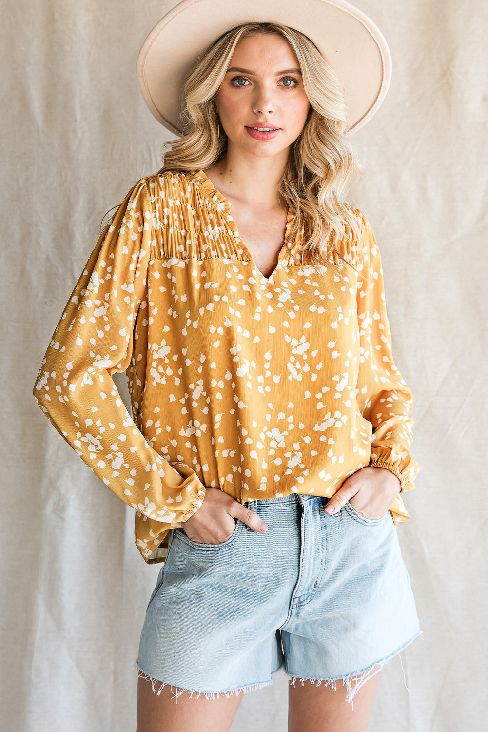 The NO Double Take Printed Notched Neck Smocked Blouse